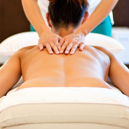 Client receiving a therapeutic back massage